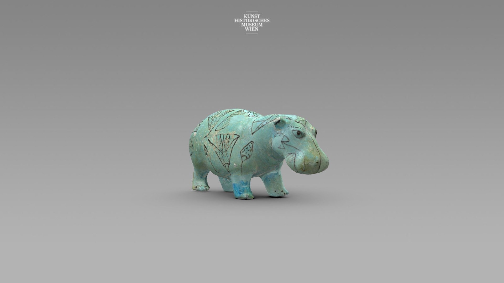 Hippopotamus figures served as grave goods in the Middle Kingdom and were considered to be a symbol for regeneration in the afterlife. The drawings on the figure depict the habitat of the animal, blooming lotus flowers and lotus buds, a flying bird with wings outstretched, placing the hippopotamus in the middle of a marshy papyrus thicket.



Nilpferdfiguren dienten im Mittleren Reich als Grabbeigabe, da das Nilpferd als Symbol für die Regeneration im Jenseits galt. Die Zeichnungen auf der Figur bilden den Lebensraum des Tieres ab, aufgeblühte Lotosblumen und Lotosknospen, ein auffliegender Vogel mit ausgebreiteten Flügeln. Das Nilpferd befindet sich gleichsam mitten im sumpfigen Papyrusdickicht.