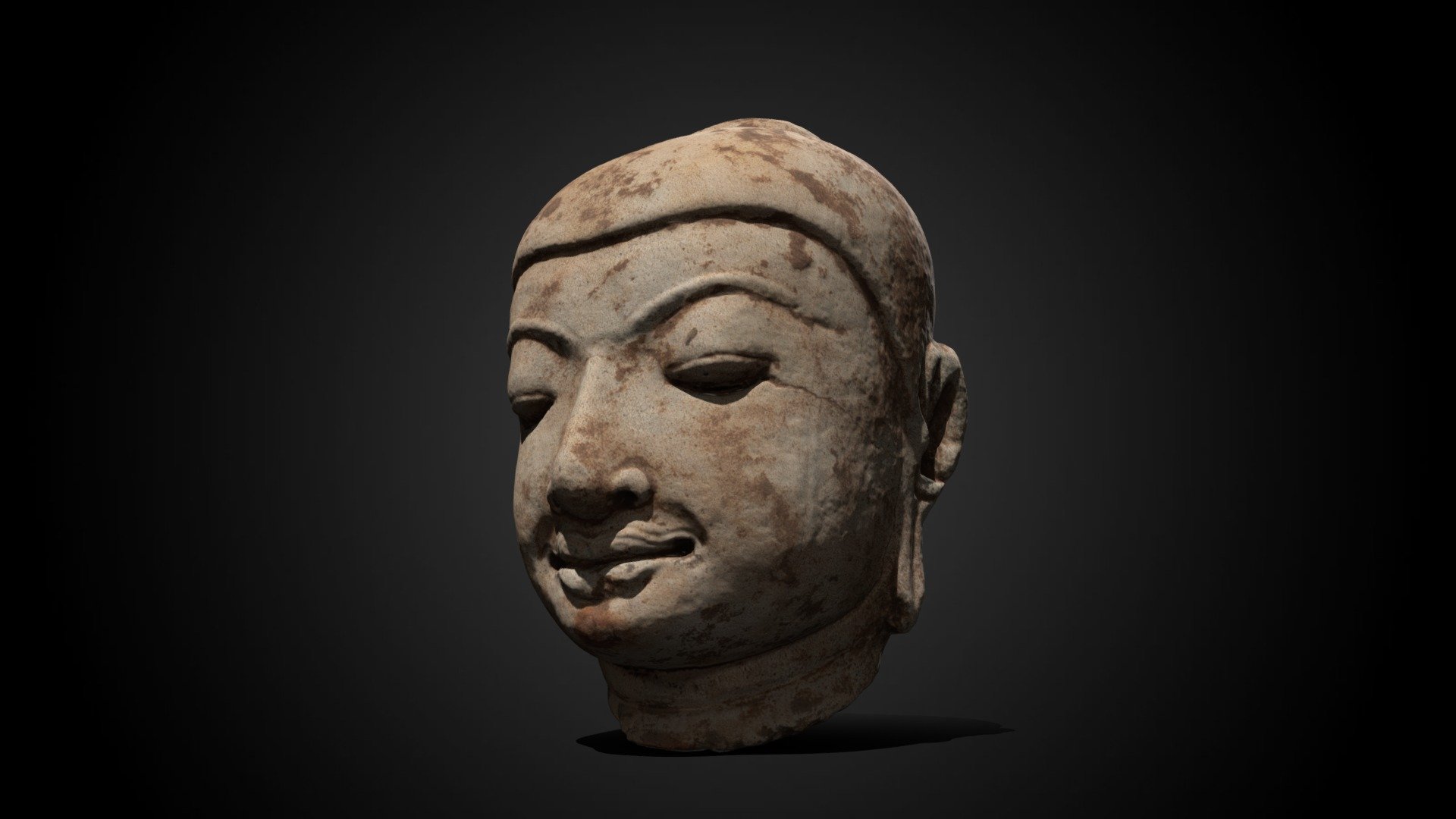 Head from an image of the Buddha, 11th-12th century CE, now in the collection of the Minneapolis Institute of Art.

From the sculpture's description on artsmia.org:

&lsquo;In what was&hellip;one of the wealthiest cities and greatest religious centers of the entire world, ancient Pagan (1044–1287 CE) in central Myanmar (Burma), more than 2,000 Buddhist monuments remain scattered across the arid plain. The largely abandoned brick stupas (reliquary buildings) and temples were once lavishly decorated with multicolored stucco (plaster) molding and sculpture&hellip;

This sensitively modeled Buddha head reflects the meditative calm and somewhat sweet, humanistic quality associated with art of the neighboring Pala dynasty of Bengal, India. Its Buddhist sculptural traditions had reached Pagan by about 1000 CE through the portable mediums of bronze and terracotta.'

More information here - Head from an image of the Buddha, 11th-12th C CE - Download Free 3D model by Minneapolis Institute of Art (@artsmia) 3d model