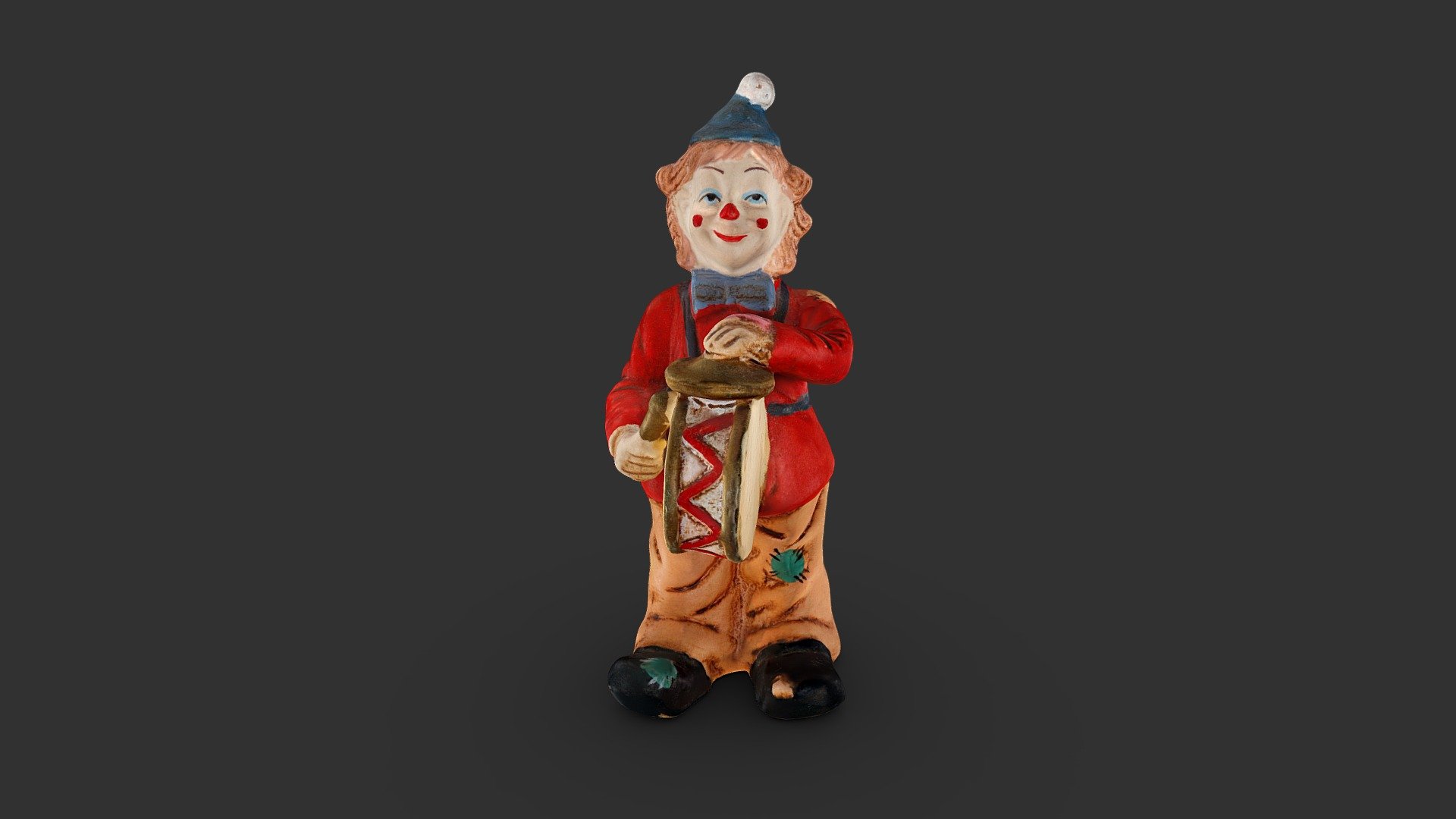 A happy clown statuette playing his drum.
Captured with a Canon 800D with CPL filter 3d model