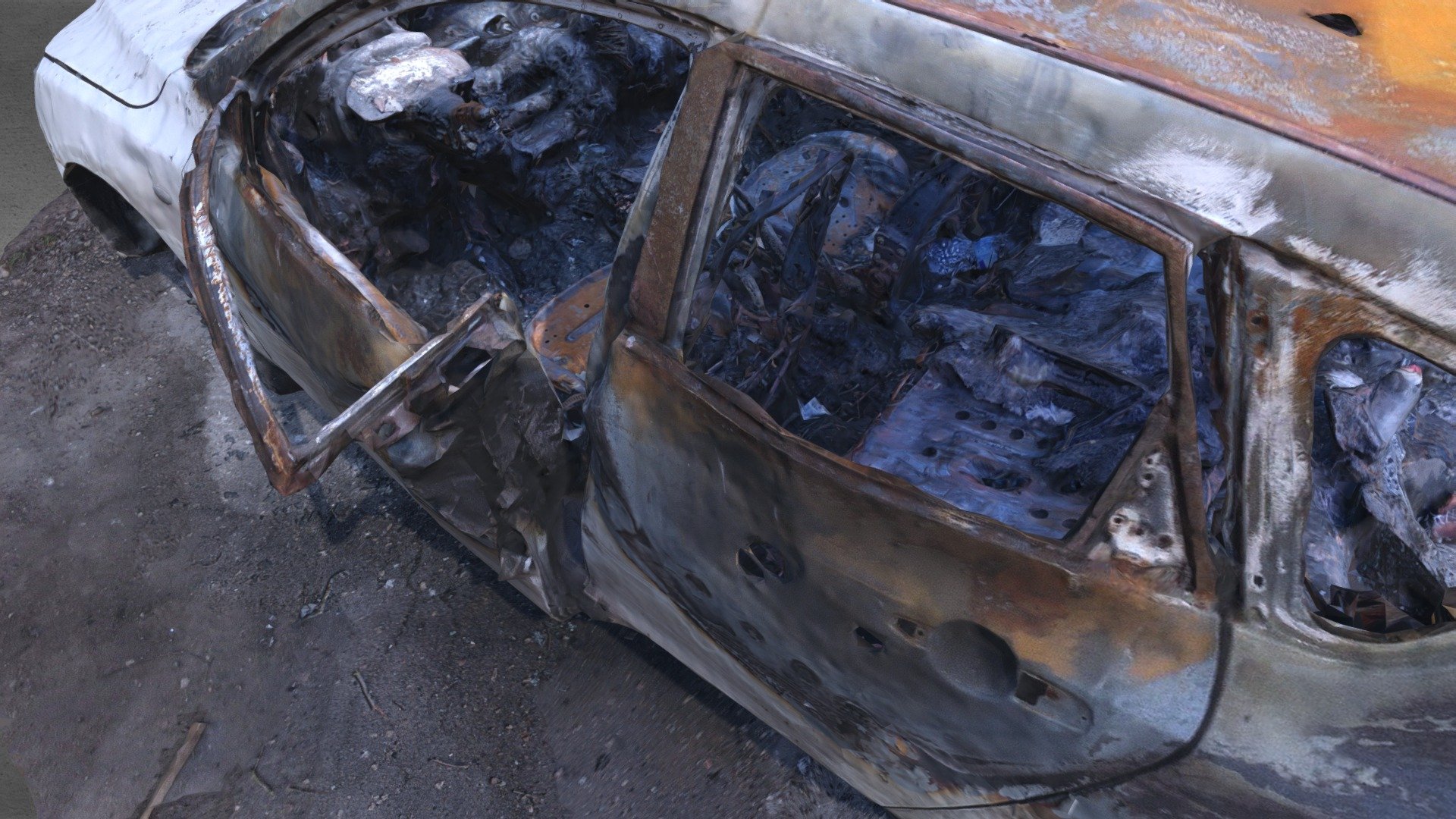A burned automobile wreck.
Car color: white.
Front part is somewhat ok, all else has been burnt. 
With normal map 3d model