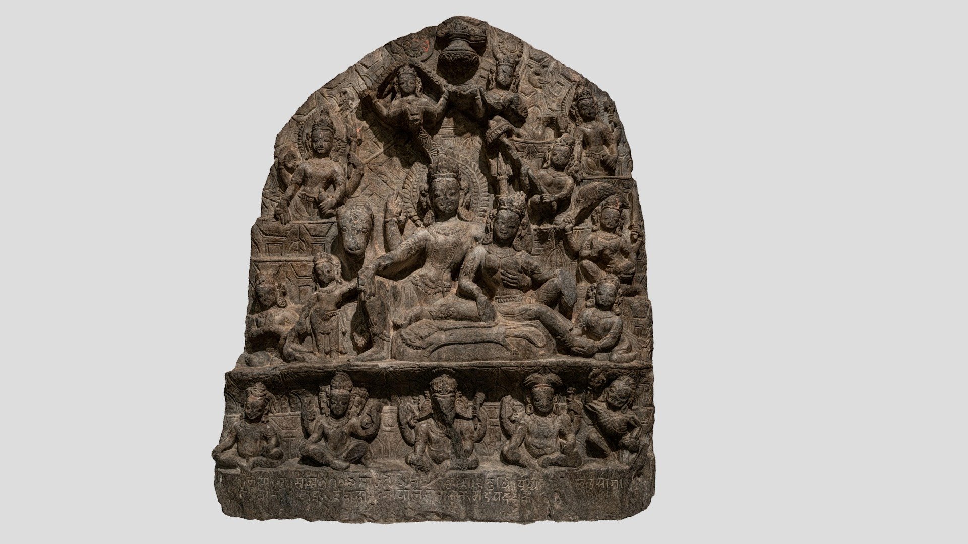 This relief likely hanged from a small resthouse in the Himalayas in the 16th century. Objects like this were believed to bring good fortune, and the favor of the pantheon of Hindu gods. 

You can see a pretty rich mythological narrative here, and it is important to remember, devotees of Hinduism in this region believe that Shiva, Parvati, and their entourage live on top of Mount Kailash. Mount Kailash is the source of legends, myths, and odd speculation.  From a public policy fordidding alpinists to climb the cone-shaped mountain, to claims by &ldquo;ancient astronaut theorists