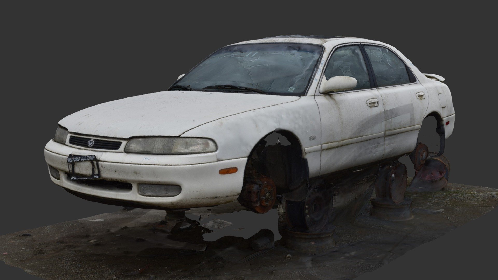 A car being sold for parts in a salvage yard. The photos were taken by https://sketchfab.com/rush_freak , he wanted me to process them for him.

Processed in Agisoft Photoscan 3d model