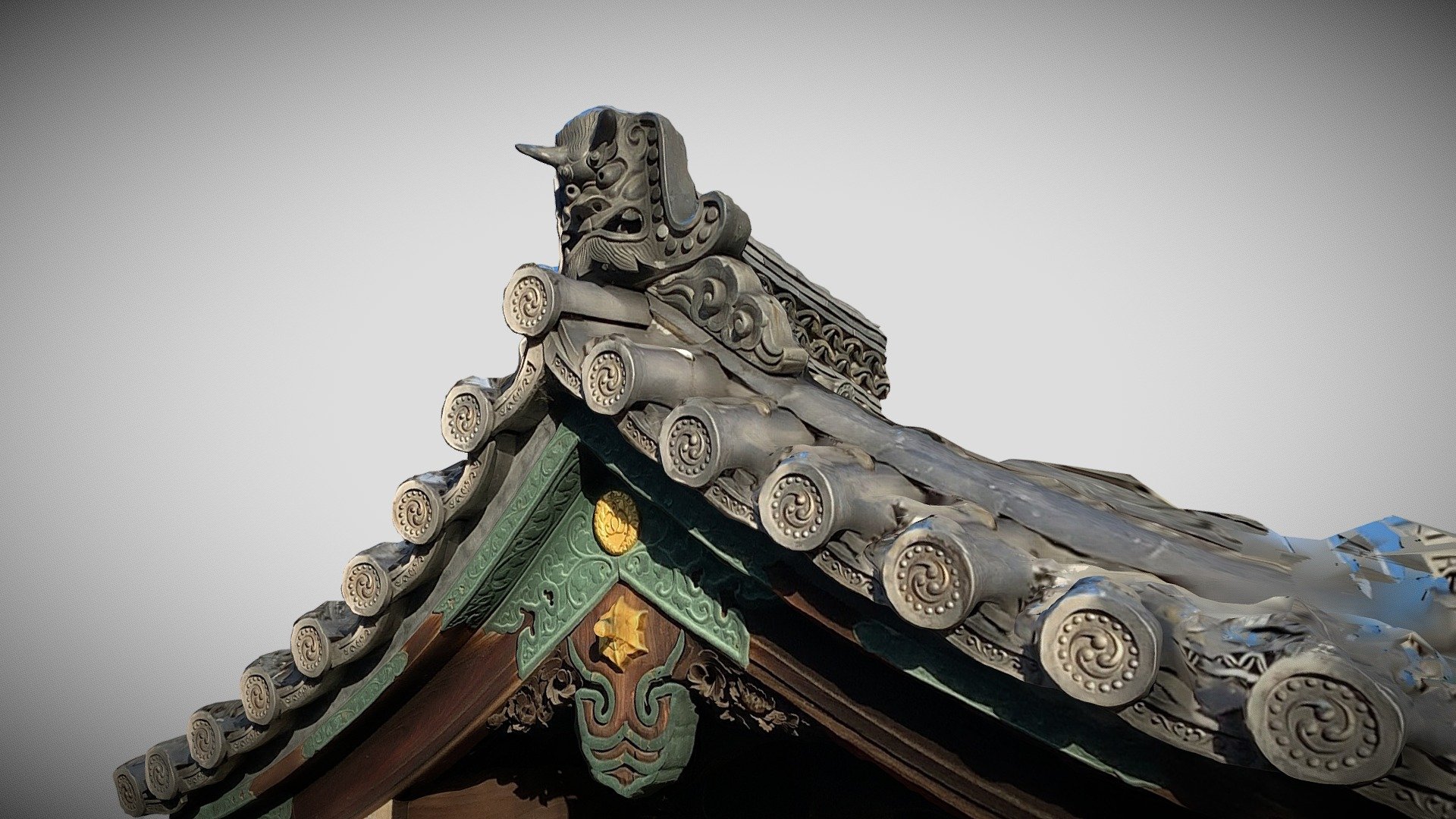 Onigawara on the top of a roof at the side of the entrancew of a temple affiliated kindergarden in Kyoto center. Two demons protect the entrance of the school 3d model