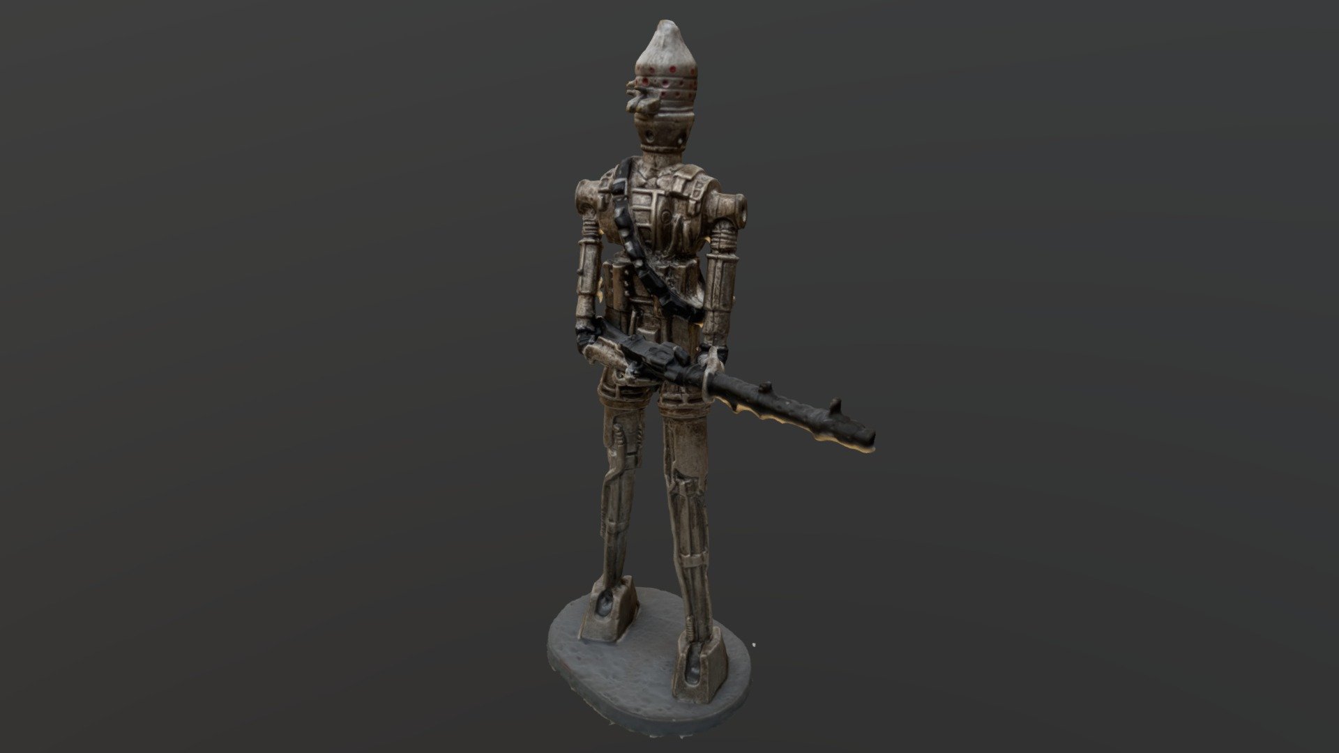 A miniature lead statue of IG-88, a character from the Star Wars franchise, captured with RealityScan photogrammetry software 3d model