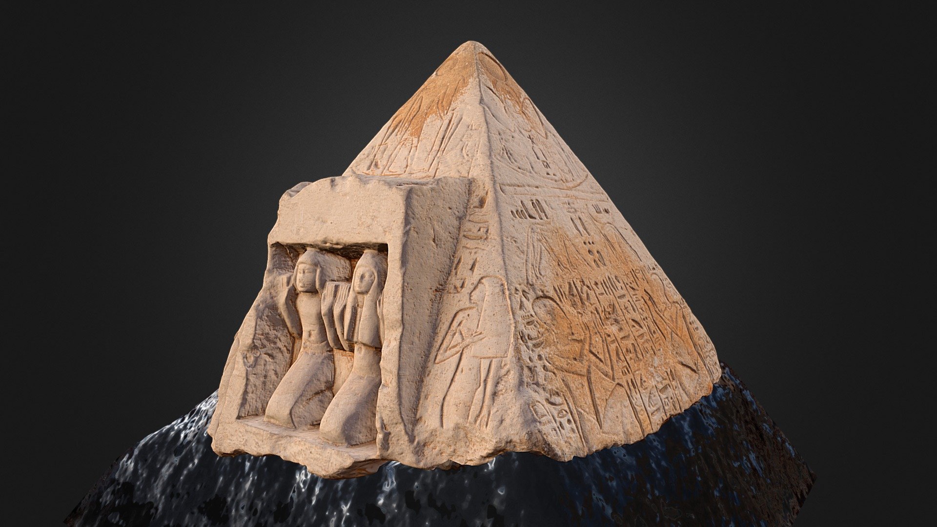 The pyramidion of the tomb of the &lsquo;Priest of the Apis' Ptah-mose. The dead couple are praying to the sun gods Khepri, Re-Harakhte and Atum. 
Limestone. 
New Kingdom, 1340-1290 BC.

3D scanned using Photohrammetry at the National Museum of Denmark 3d model