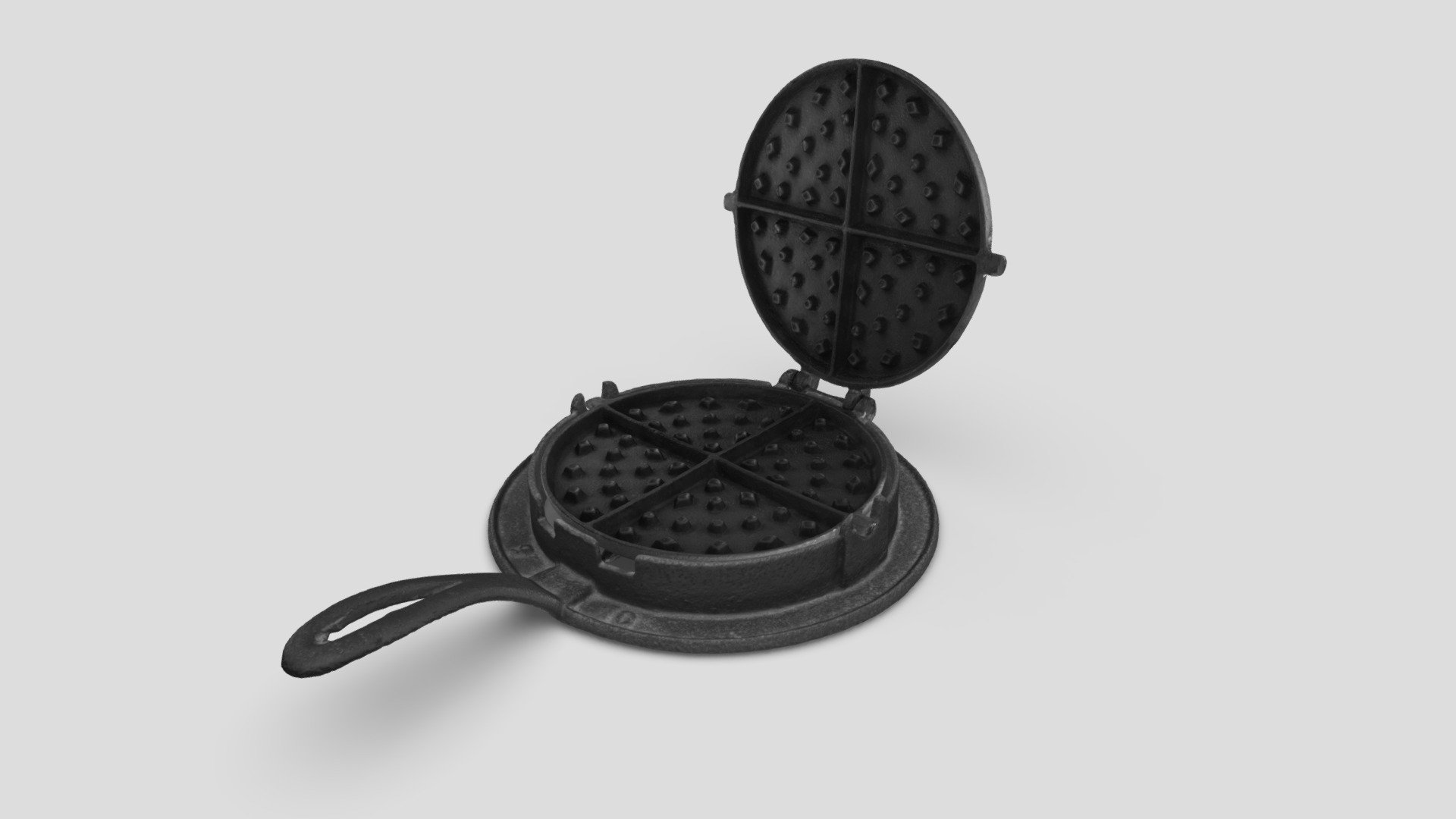 This cast iron waffle maker was made from a pattern used by multiple foundries in the 1800s and has no maker's marks on it, making it impossible to know exactly who made it. It is believed, however, given where the artifact is from, that this particular waffle iron was manufactured by the Terstegge, Gohman &amp; Co. foundry in New Albany, Indiana. This foundry also produced Anchor Stoves &amp; Ranges. Again, there is absolutely no way to know for sure who made it — it's only an educated guess. This waffle iron produces waffles with a playing cards pattern — hearts, diamonds, etc. This was an extremely popular waffle iron pattern at the time.

This artifact is housed at New Albany's Culbertson Mansion State Historic Site and was digitized using photogrammetry. The base and paddles were digitized seperately and combined in post-processing 3d model