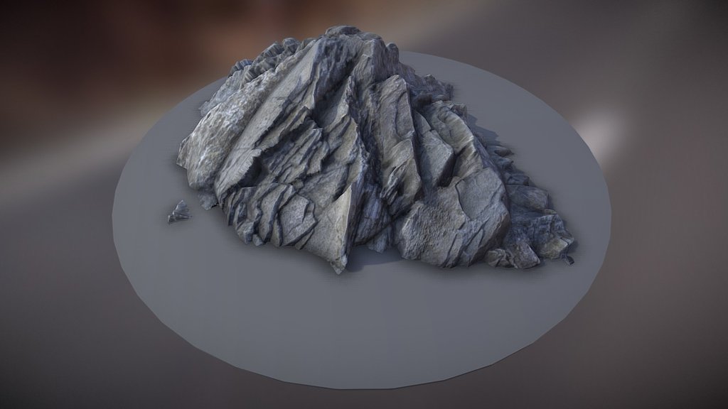 Quick test using my latest photogrammetry rock textures.  Rather than capturing full 3D rock scans, why not build a tileable texture and use it to displace meshes and create rock formations? That way all your rocks share the same texture, which can save an incredible amount of memory. Furthermore the results are still pretty realistic! You could even imagine creating a modular set of planes, and then just apply a different texture/displacement and make a totally different environment in seconds.  You can get these textures and a tutorial here : -link removed- - Photogrammetry Rock - 3D model by sebvhe 3d model