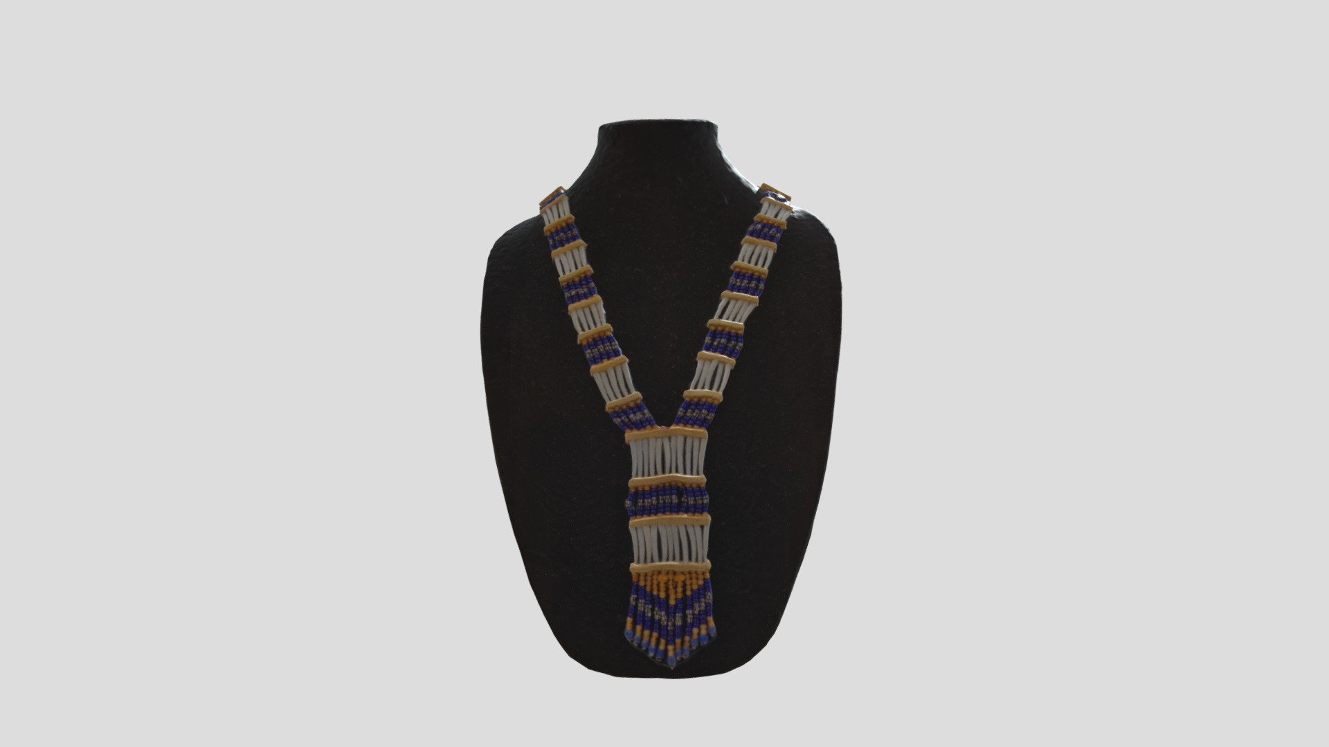Created by Koyukon artist Selina Alexander. 

Materials: Dentalia shells, smoke-tanned moosehide, cariboue hide, glass trade beads.

The use of dentalia shells in Athabscan regalia represents high status. The shells are a trade item that likely originates from the Vancouver area of Canada. The dentalia shell necklace is one of the five symbols used for wayfinding at the Alaska Native Heritage Center. It was commissioned by the Center directly with the artist 3d model