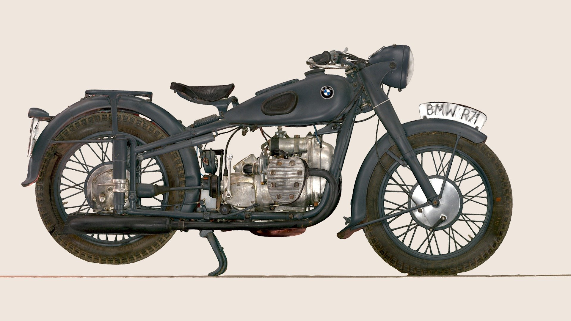 Name: The BMW R 71 746 cc 

Year: 1938

Description: The BMW R 71 746 cc (45.5 cu in ) big flat-twin motorcycle was exceptional. It was the Icon of BMW, expensive to build and well engineered. Unfortunately only 2638 motorcycles could be built before production was disrupted due to the War. Original bikes are now rare and highly sought after. Around 500 are known to survive today.

Technology used: 3D handheld scanner

Made by: Piotr Bialobrzycki

Copyright: Copyright © 2021 FWNDK. All rights reserved 3d model