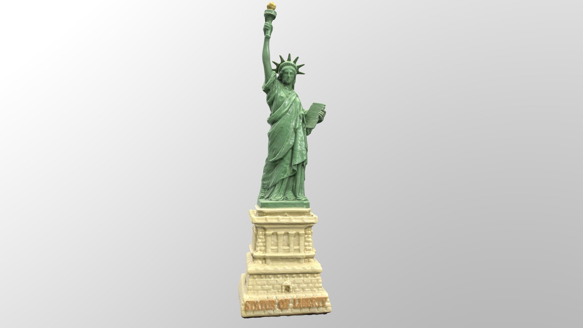 Photoscan of a small Statue of Liberty souvenir from New York City.
about 3