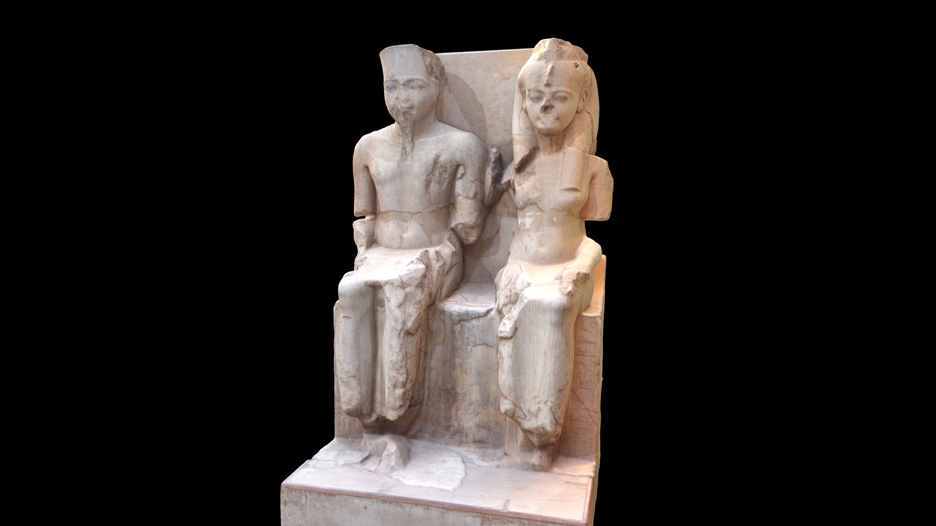 Dyad of Tutankhamen and his queen Ankhesenpaaten in the form of the god Amun and goddess Mut.  Luxor Temple, Luxor, Egypt.

This dyad statue in calcite/alabaster was originally carved in the 18th Dynasty with the features of Tutankhamen and his queen.  The staute was later usurped by Rameses II at which time the names were recut to his cartouches.

Created from 106 photographs (Canon EOS Rebel T7i).  Minor repairs to the tops of the heads and top of back made with Blender 2.8 3d model