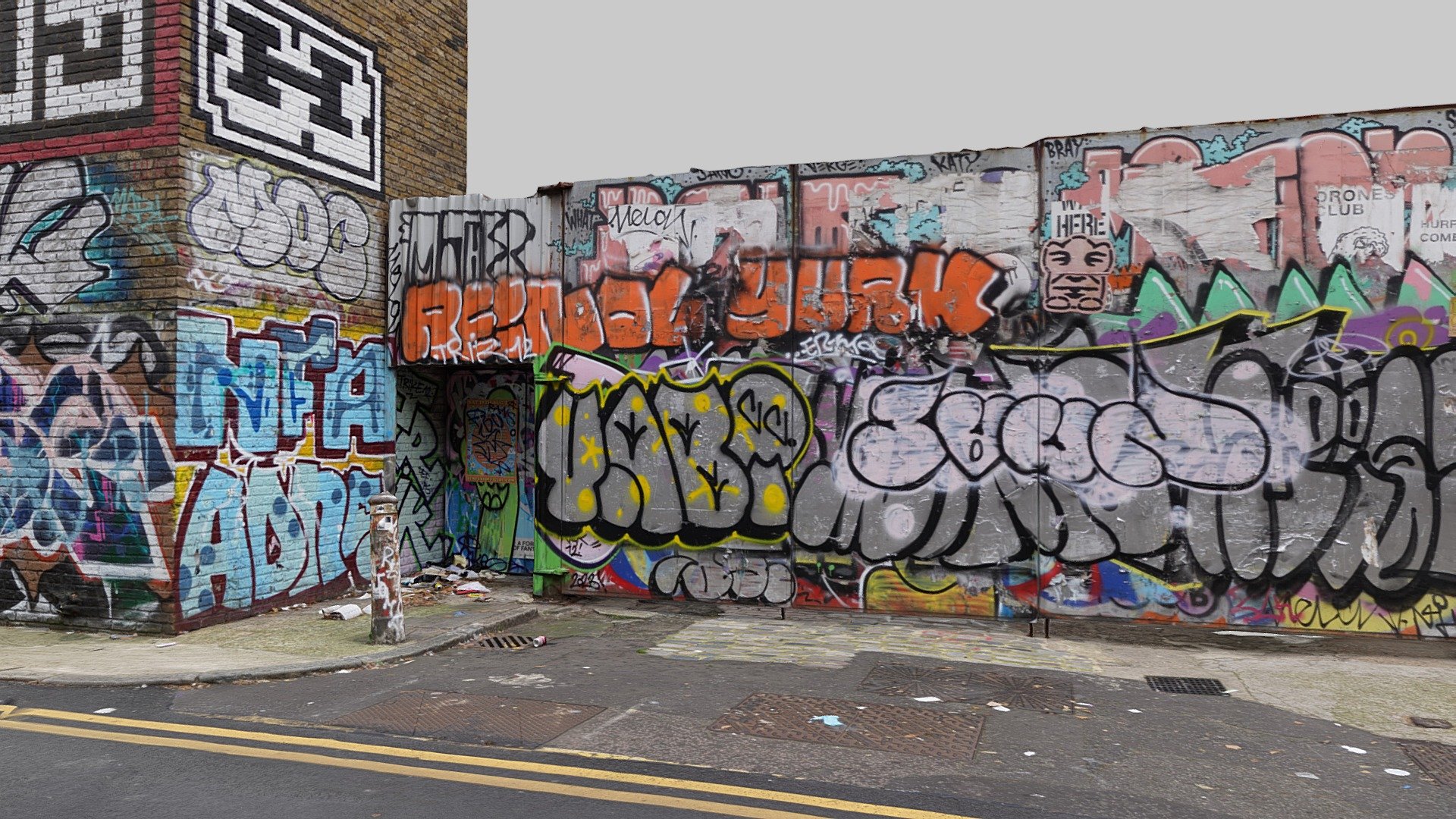 A graffiti covered wall and gate on the south side of Quaker Street, off Brick Lane, London.

The wall forms the northern boundary of the Truman Brewery Site.

1741 photos taken in September 2023 with a Sony a7R III and processed in Reality Capture 3d model