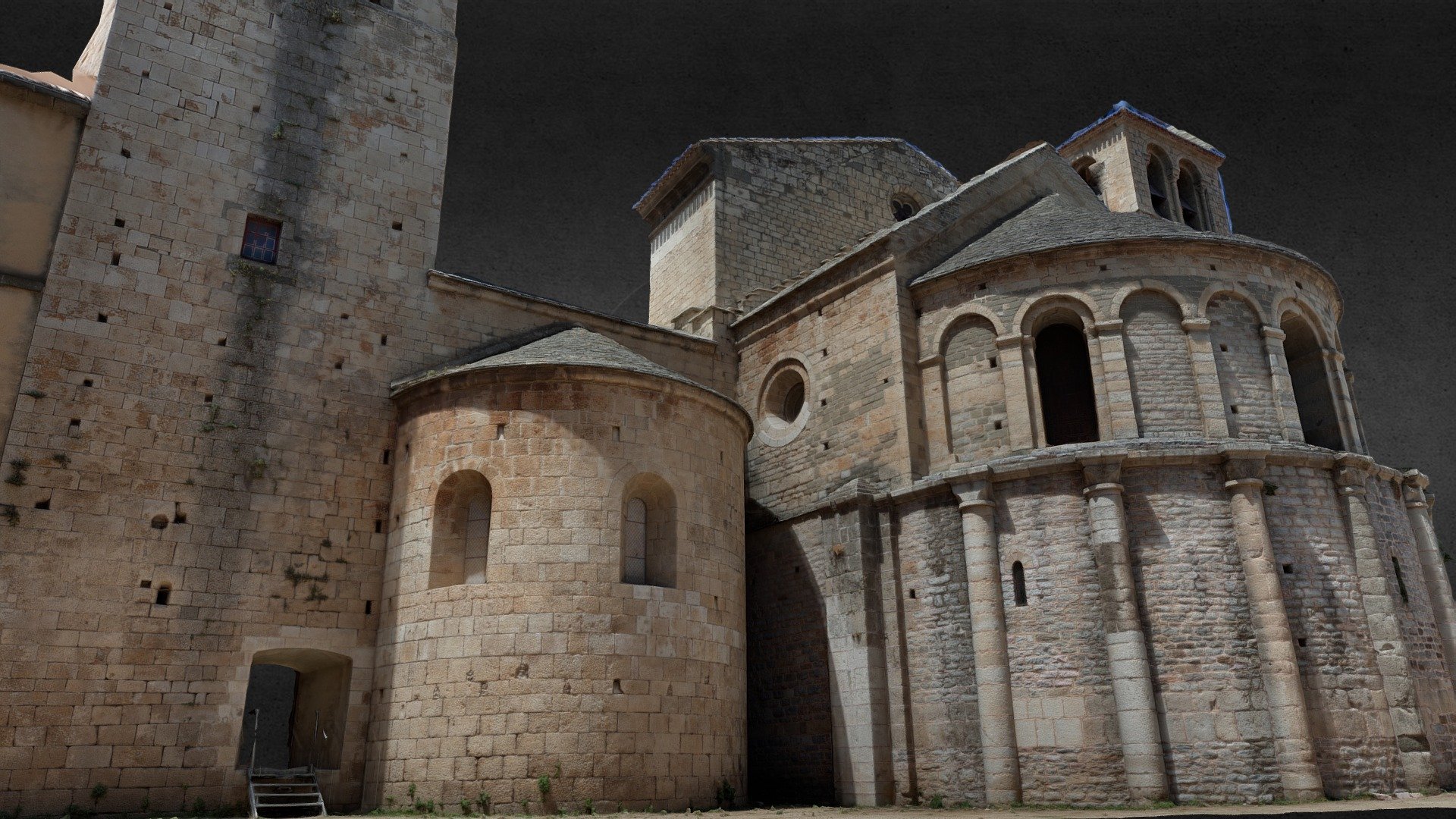 Chevet roman de l'abbaye de Caunes-Minervois. 

&ldquo;L’Abbaye de Caunes-Minervois traverse le temps, depuis son fameux chevet roman jusqu’au cloître mauriste. On y visite également les vestiges archéologiques du cloître médiéval et de l’église carolingienne fondée en 790&hellip;