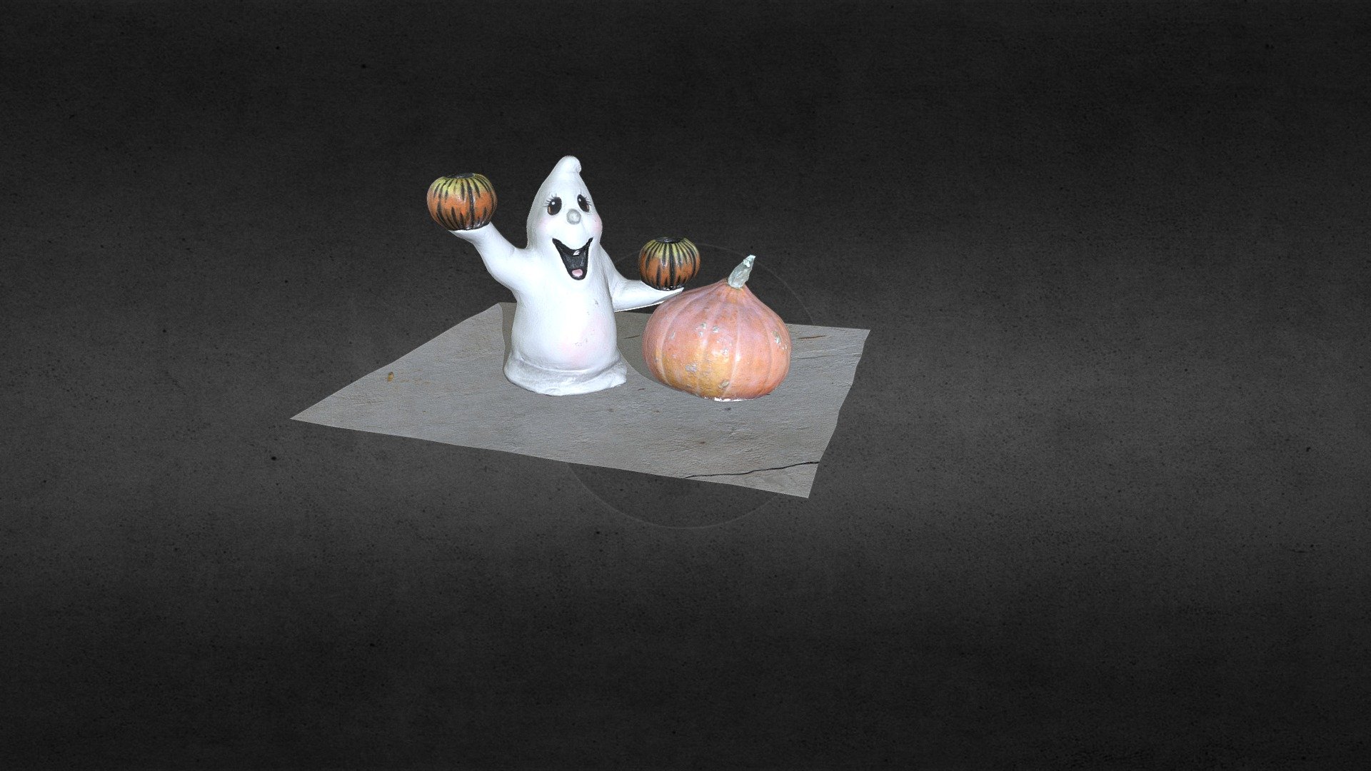 These are photo captured models made from high poly models of a small pumpkin gourd, and ghost statue and concrete ground taken from the front build of technical building at wake tech southern campus that were made in reality capture 3d model