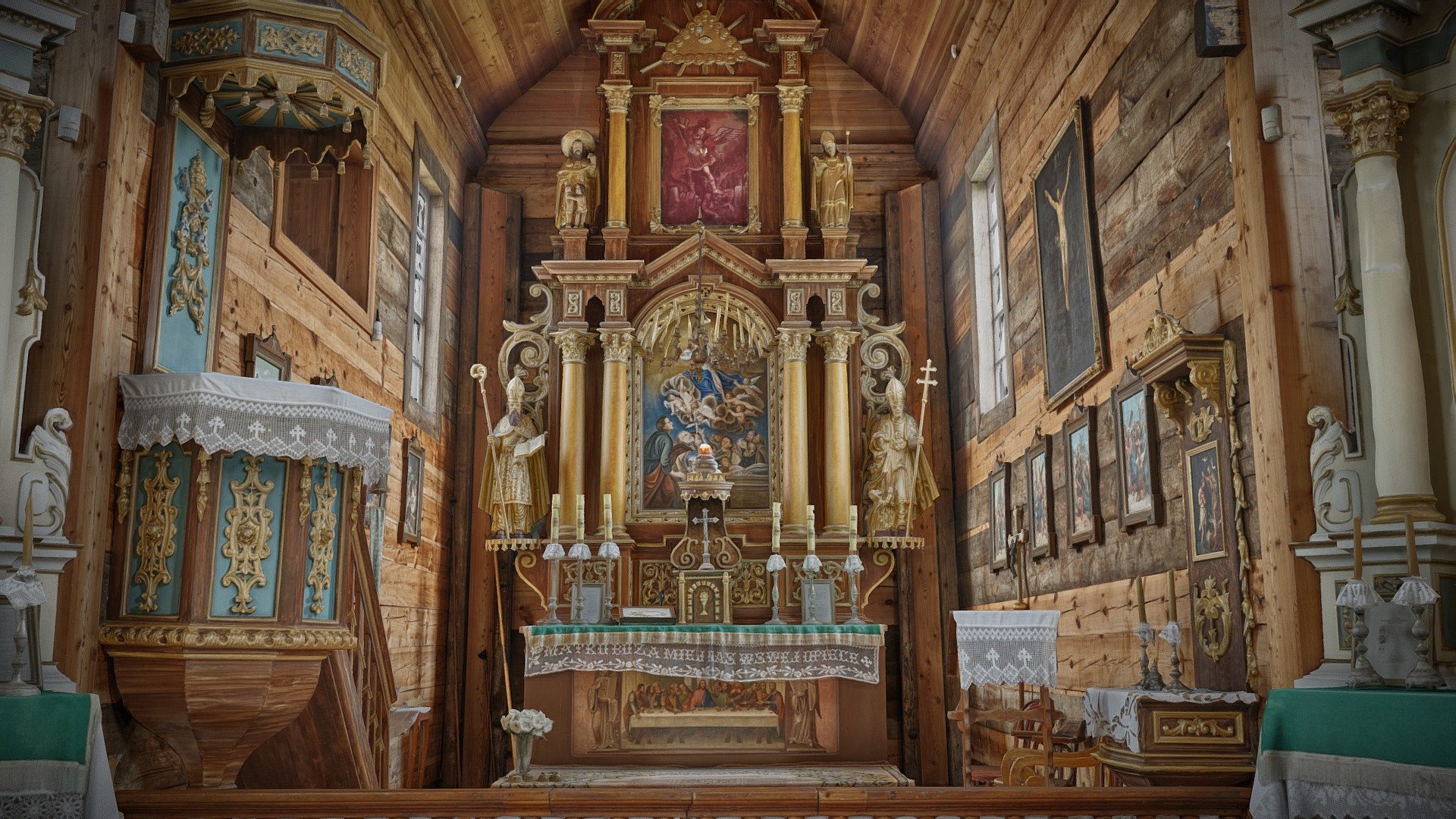 Ten drewniany kościół to najstarszy oryginalny obiekt w lubelskim skansenie. Wybudowano go około 1686 r. Posiada cztery wnętrza: kwadratową nawę, prostokątne węższe prezbiterium, przedsionek i zakrystię. Jest najstarszym zachowanym drewnianym kościołem parafialnym na Lubelszczyźnie, z unikalną w drewnianej architekturze sakralnej lożą kolatorską nad zakrystią. Pierwotnie funkcjonował w Matczynie k. Bełżyc jako wiejski parafialny. Natomiast w sektorze Miasteczko to ekspozycja kościoła parafii tzw. II klasy, wg ówczesnej administracji kościelnej, obejmującej kilka, kilkanaście pobliskich wiosek. Wyposażenie wnętrza przywołuje przełom lat 20. i 30. XX w., z dominującym wystrojem barokowym i późnobarokowym, kształtowanym w okresie od poł. XVIII do poł. XIX w. Obecnie w kościele odprawiane są również okolicznościowo Msze Święte, udzielane sakramenty ślubu i chrztu 3d model