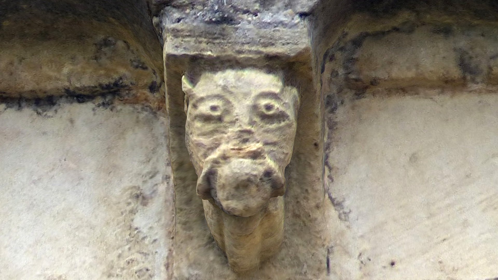 Medieval corbel along the southeast upper teir of Winchester Cathedral. Image quite weathered and hard to identiful the beest – pointy ears, long snout but with human arms and wide eyes.

Photographs taken 2021 3d model