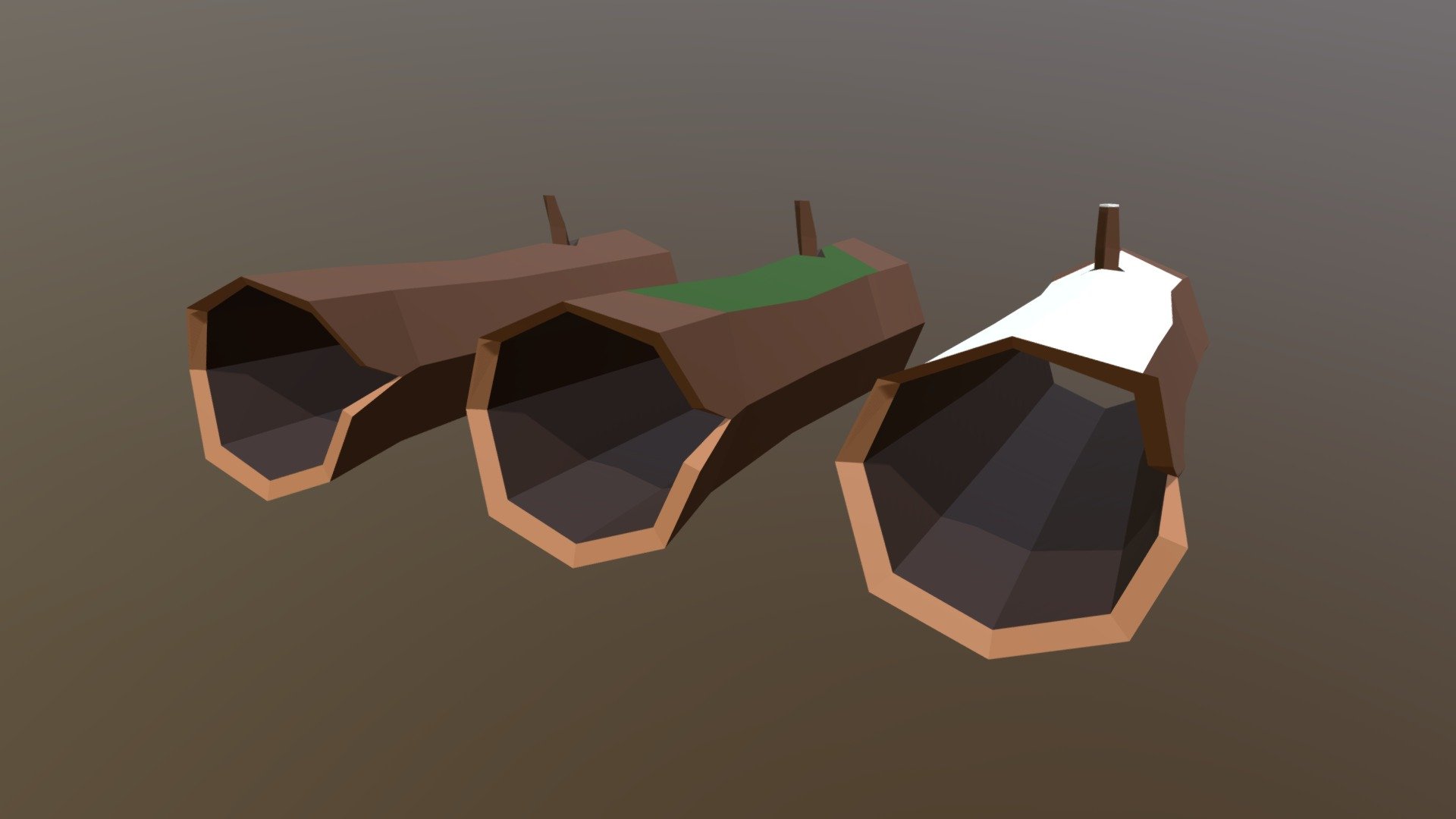Here I created three different types of tree trunks in low poly style. Once with snow, moss and neutral 3d model