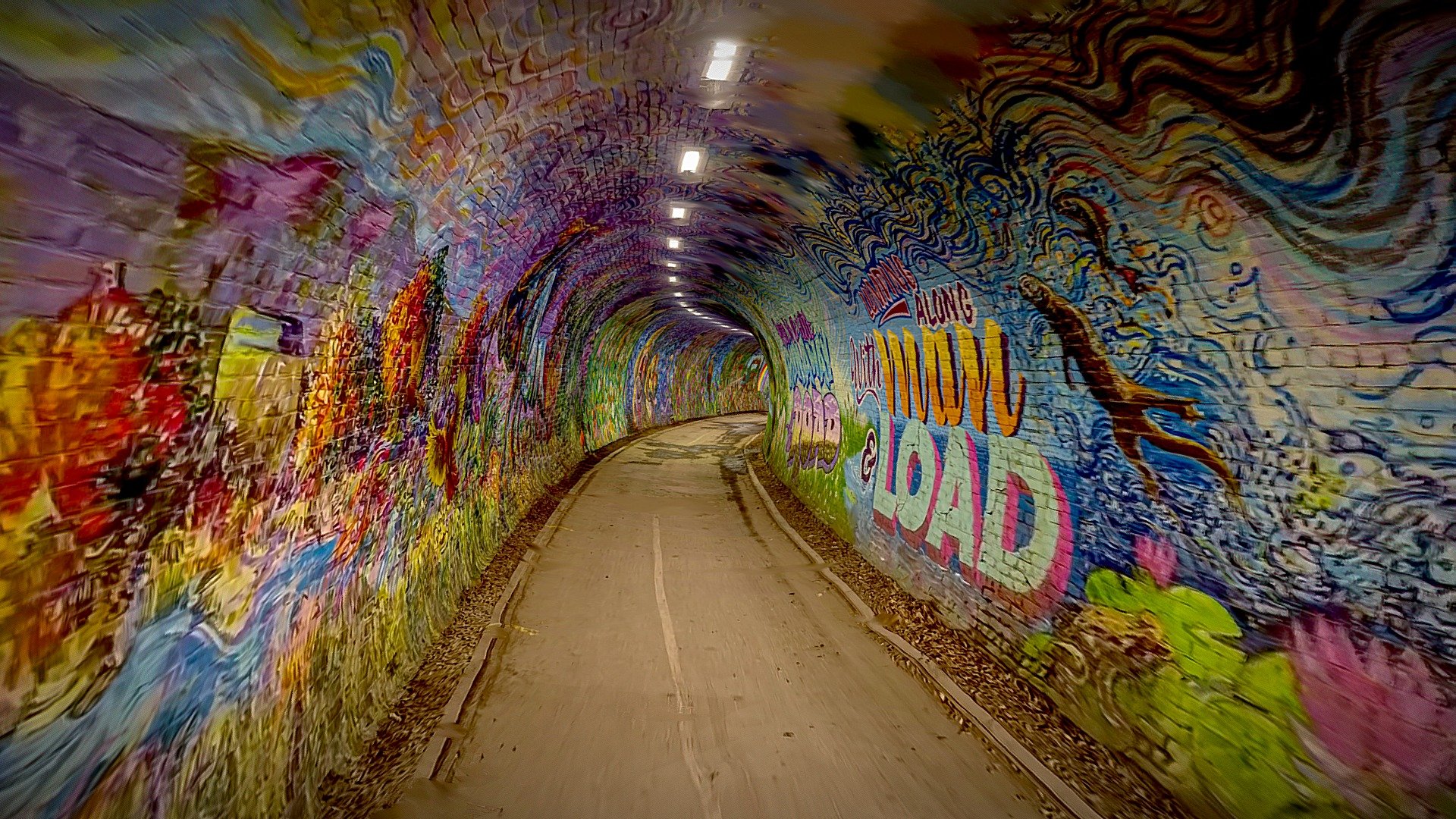 An old railway tunnel, linking Colinton Village to Craiglockhart Dell. It has been transformed into an enchanting walk-through by the installation of Scotland’s largest historical mural. 

The art team was led by Chris Rutterford and was commissioned by The Colinton Tunnel, a charity organisation set up to support local arts, heritage, citizenship and community development 3d model