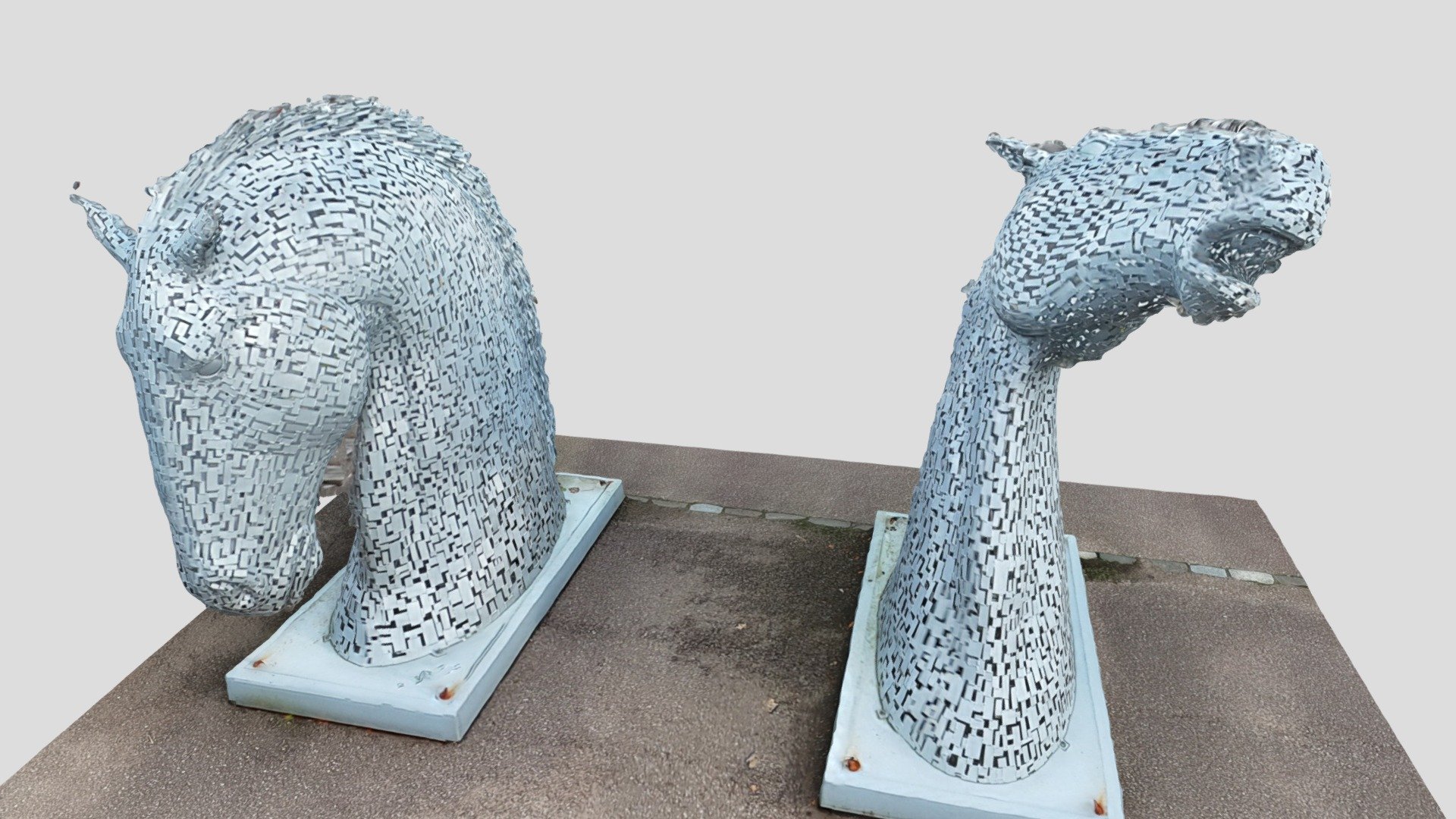 Many people are familiar with the art installationin in the Helix Park,  adjacent to the Falkirk Wheel - the large Kelpies - at 30 metres high, they are the world's largest equine sculptures, created by Andy Scott in 2013.

What is less well known is that a mini version of these iconic sculptures, the pre production  &ldquo;maquettes