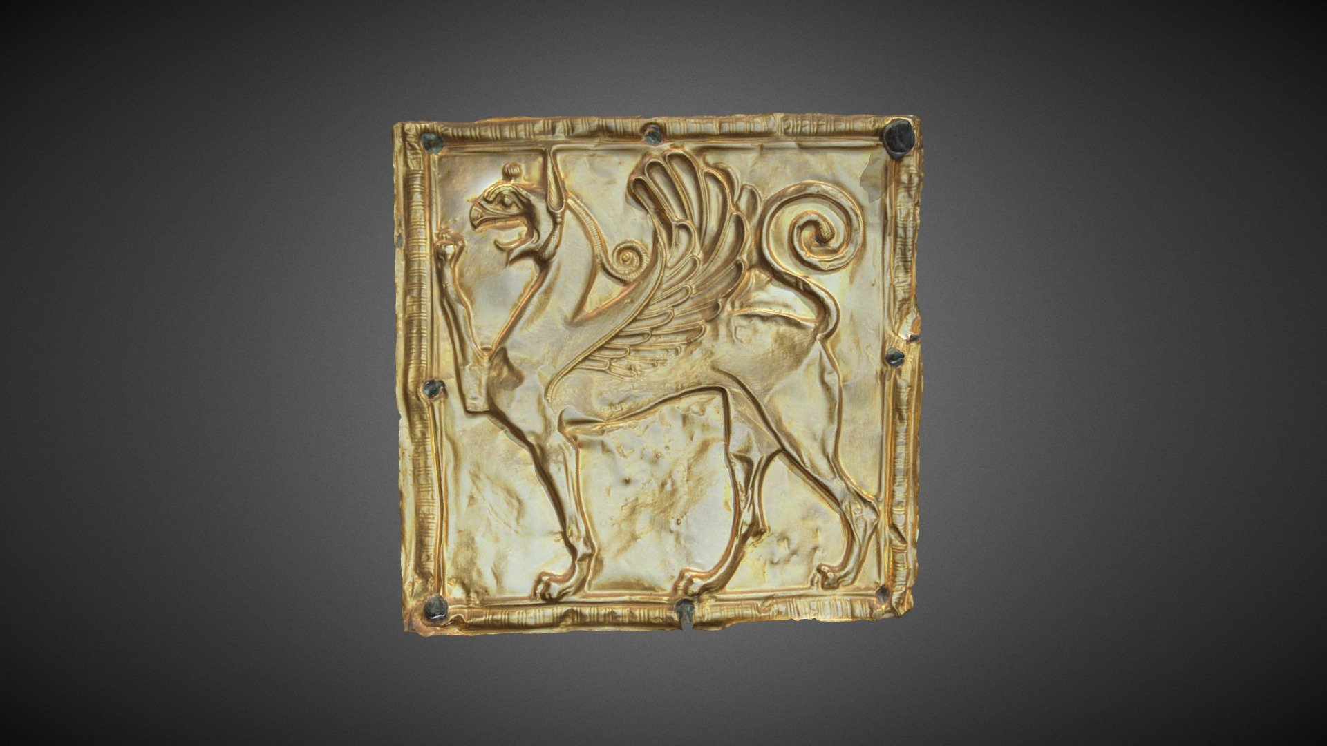 Επιστήθιο κόσμημα από το χρυσελεφάντινο άγαλμα της Άρτεμης

Χρυσό τετράγωνο έλασμα με έκτυπη παράσταση γρύπα, στερεωμένο με καρφιά πάνω σε χάλκινη πλάκα που κοσμούσε το ένδυμα της μορφής ως επιστήθιο κόσμημα. 6ος αιώνας π.Χ.

Breast jewelry of the chryselephantine statue of Artemis

Square plate of gold with relief griffin riveted on a bronze plaque, which decorated the figure’s garment as breast jewelry. 6th century BC 3d model