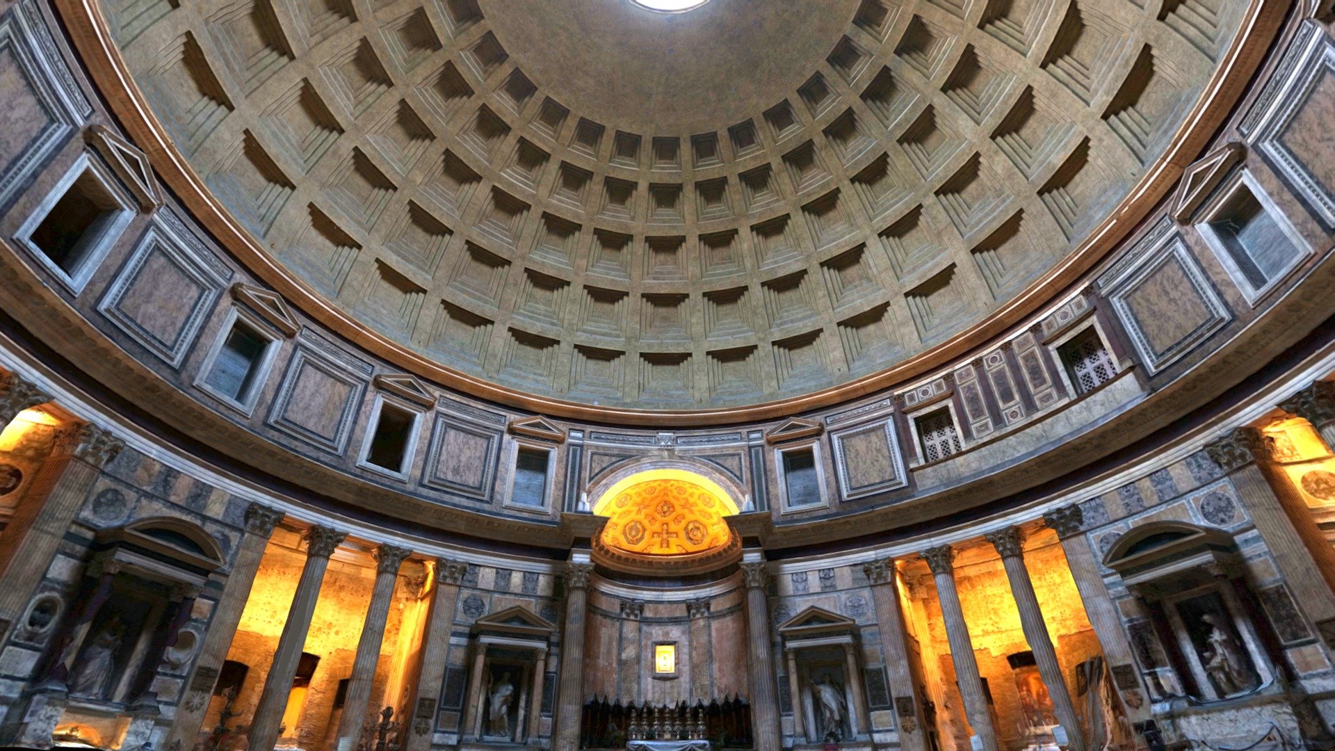 The interior dome and walls of the Pantheon, in Rome, Italy.

The structure known today as the Pantheon was originally constructed by Marcus Agrippa during the reign of Augustus. The present building was restored or completed by the emperor Hadrian.  

Remarkably, the Pantheon has been in continuous use since the 100's CE, when it was likely dedicated by Hadrian in 126. Since the 7th century, it has been used as a Catholic church.

The dome of the Pantheon is still the largest un-reinforced concrete dome in the world, and forms a perfect half-sphere 3d model