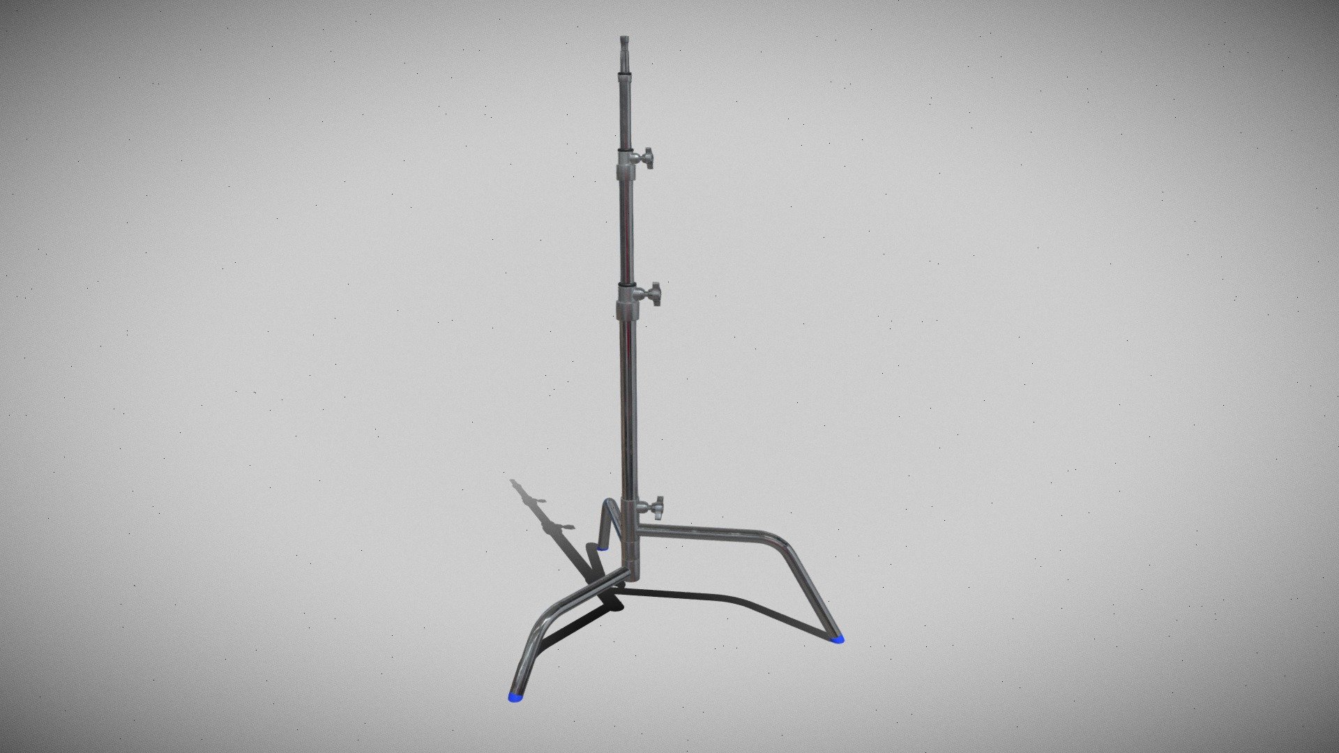 3D model of a C-Stand, a versatile and essential tool used in photography, filmmaking, and video production. The C-Stand features a sturdy base, an adjustable height column, and a boom arm for holding lights, reflectors, and other equipment. Perfect for setting up lighting setups and achieving professional results in your creative projects 3d model