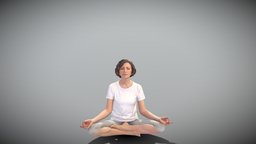 Woman in lotus position meditating 440