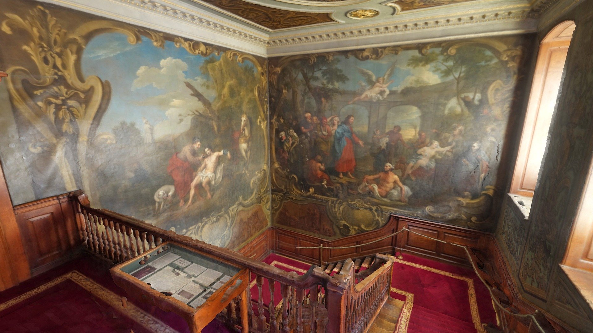 A grand staircase at St Bartholomew’s Hospital, Smithfield, London. The walls are decorated with paintings by William Hogarth (1697-1764).

The paintings depict The Pool of Bethesda and The Good Samaritan.

https://bartsheritage.org.uk/restoring-historic-barts/buildings/ 

The staircase can be visited through the hospital museum which is usually open on Wednesdays.

661 photos taken in September 2021 with a Sony a7R III and processed in Agisoft Metashape.
The model is a bit messy due to the refective wooden surfaces and bright lighting through the windows. It has therefore been heavily cleaned up around the banisters and windows 3d model
