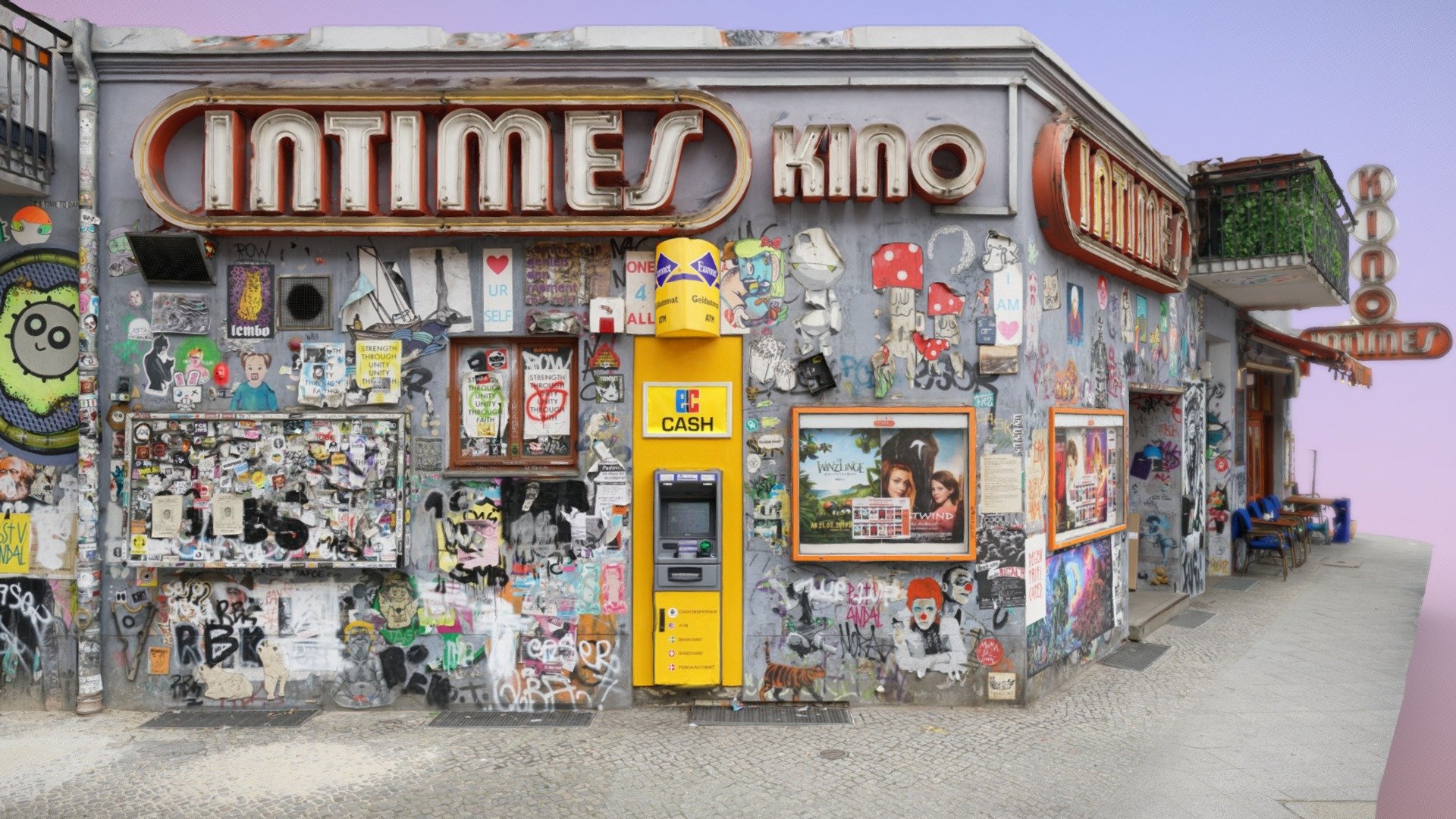 An interesting cinema and cafe entrance at the corner of Boxhanger Str. and Niederbarnimstraße of Berlin that features the &ldquo;Graffiti Wall of Fame