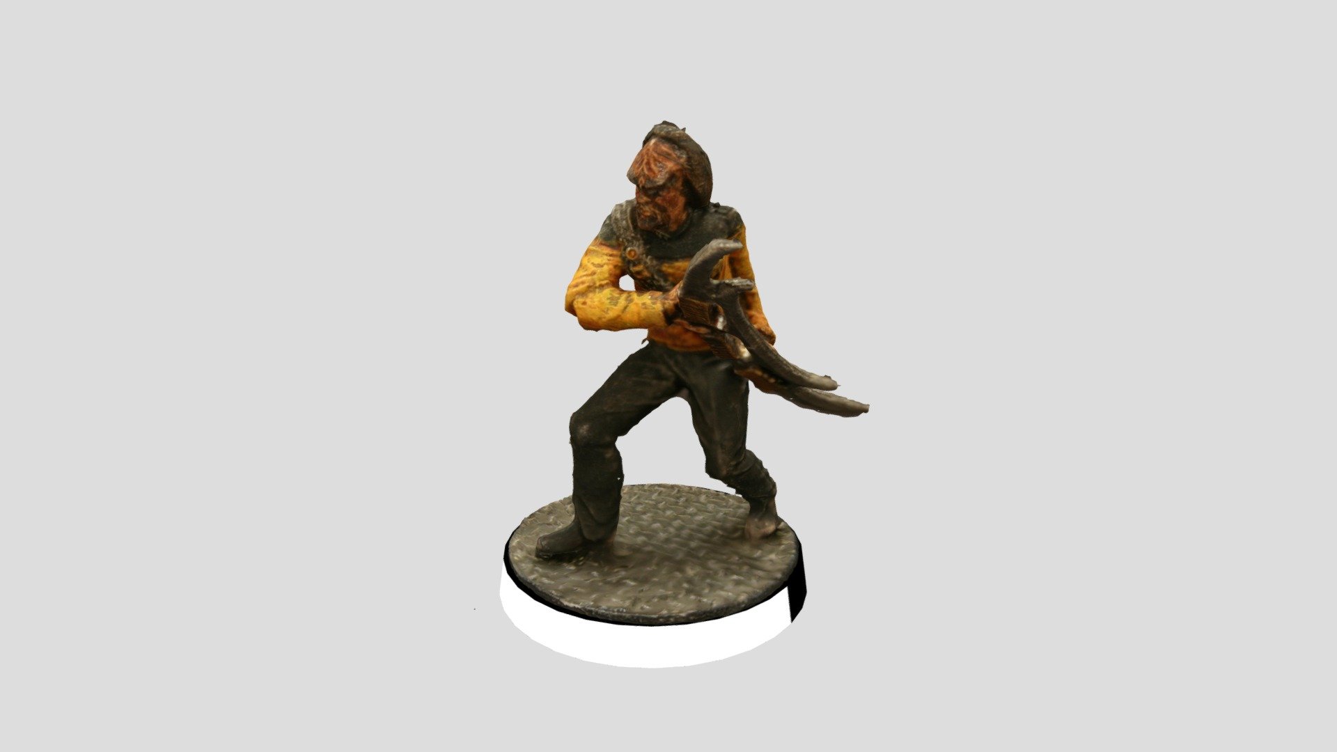 Based on Modiphius' STAR TREK Adventures: The Next Generation

If you would like to 3D Print this model you can purchase the files here:
https://www.modiphius.net/products/star-trek-adventures-print-at-home-tng-bridge-crew-set?_pos=63&amp;_sid=5e411b6a9&amp;_ss=r

Photography &amp; photogrammetry by myself, Chad Curran ( https://www.facebook.com/chad.curran.58/ )

Leutenant Worf is the chief of security and the head of tactical on board the Galaxy Class starship the Enterprise D. Here he is weilding a klingon Batleth. Worf also served on Deep Space Nine 3d model
