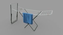 Drying rack with a towel and wooden clips