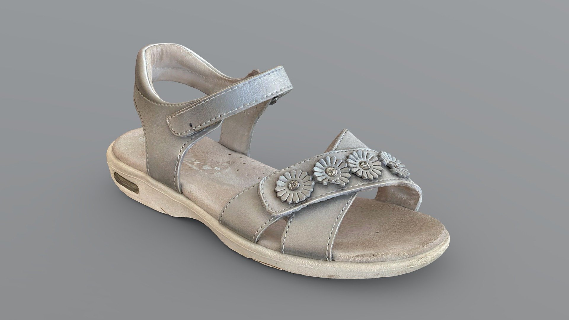 A much better 3D re-scan of a girl’s well worn silver sandal - Airflex branded.

Created with Polycam - Girls Sandal shoe - Airflex 3D scan - Download Free 3D model by jkyfk 3d model